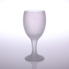 Empty glass isolated on grey and white background for mockup or souvenir