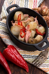 Jerusalem artichoke au gratin with ham and chili. Fricassee, fruits