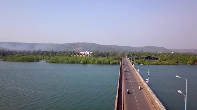 Low angle drone shot of Siolim Bridge, Goa, India