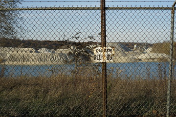 Danger Keep Out sign warning people of the danger in a Delphi indiana limestone quarry that supplies water to the Wabash and Erie Canal 