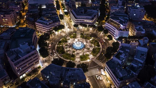 Big roundabout - Aerial hyperlapse - Dizengoff square in tel Aviv, Israel, at night, 4k drone view