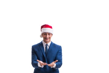 Young busnessman wearing santa hat in christmas concept on white