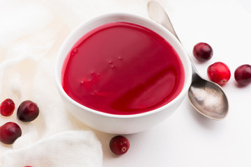 Bowl of Jelly with Cranberry on a white background
