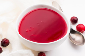 Bowl of Jelly with Cranberry on a white background