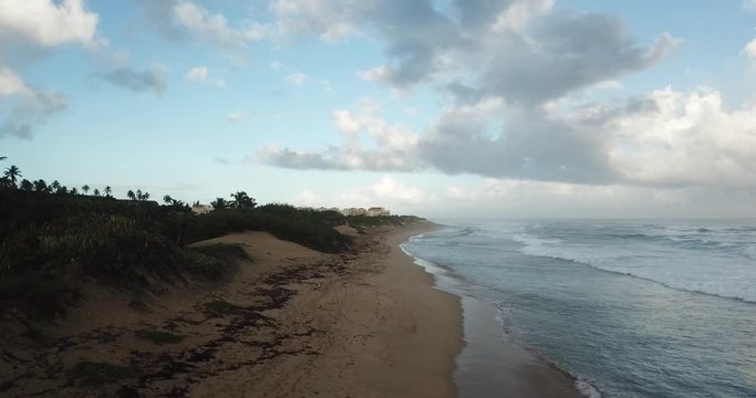 Aerial shot of beach with waves in Jobos Puerto Rico