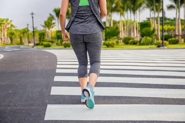 Women exercising. Runner woman running in the morning at the public park.