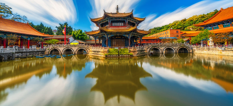 Panorama of Yuantong Temple refletion with waterfront, Kunming capital city of Yunnan, China, travel and tourism,famous place and landmark, religion and traditional concept