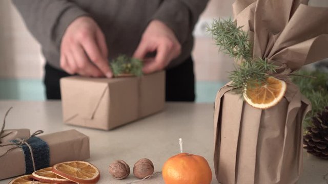 Zero waste gift wrapping. Organic Life. Reusing brown kraft paper and paper shopping bags. Natural organic compostable decor. Eco-friendly holiday season