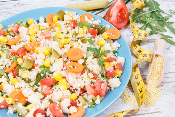 Salad with couscous and vegetables. Best nutritious food for dieting and slimming. Source vitamins...