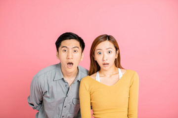 Portrait of  surprised  young couple standing together
