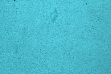 light blue solid brushed plaster on the material texture - beautiful abstract photo background