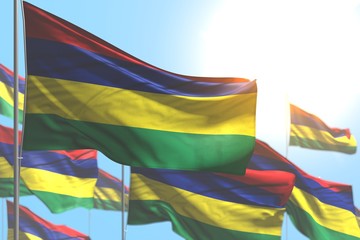 cute many Mauritius flags are waving against blue sky picture with selective focus - any holiday flag 3d illustration..