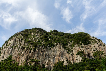 Fototapeta na wymiar High mountain view with blue sky background.