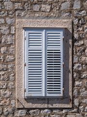 Fototapeta na wymiar Window shutter in Dubrovnik Old Town on the Adriatic Coast, Croatia