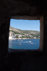 Fototapeta na wymiar Tourists visit Dubrovnik Old Town on the Adriatic Coast, Croatia