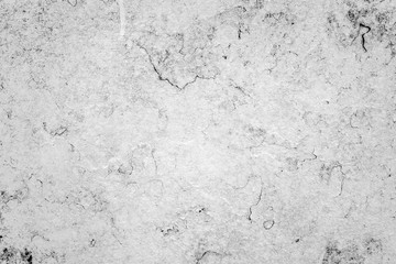 Texture of a concrete wall with cracks and scratches which can be used as a background