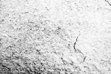 Texture of a concrete wall with cracks and scratches which can be used as a background