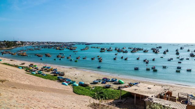 Hundred of Vietnamese fishing boats anchored at sea, Mui Ne, Vietnam time lapse