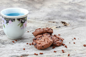 Cookies with water slowly on the wood floor in the morning
