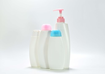 White plastic bottle For lotion, body lotion on a white background.
