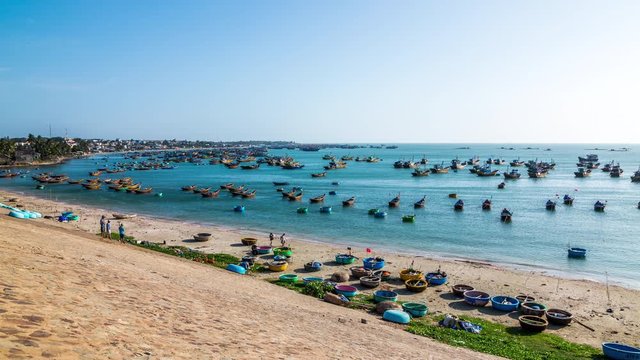 Hundred of Vietnamese fishing boats anchored at sea, Mui Ne, Vietnam time lapse