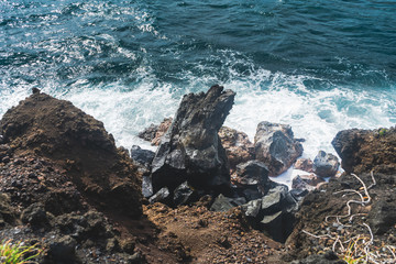 Shiny Rock by the Ocean Coast