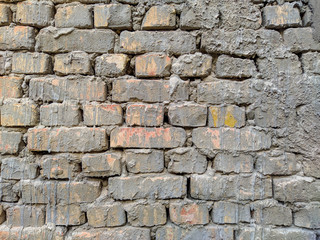 Old bricks texture. Bricks with cement background backdrop photo for design. Vintage wall with stone brick facade.