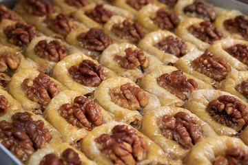 Turkish arabic dessert - baklava with honey and walnut, pistachios nuts