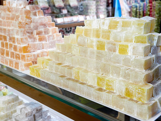 Turkish delight for dessert. Lokum dish with different flavors on sale in Istanbul food...