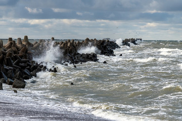 Liepaja port north breakwater in storm.