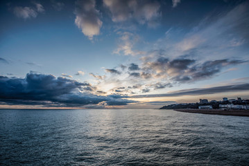 Sunset over the English Channel and Folkestone from the Harbour Arm.