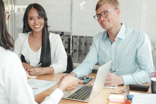 business people discussing on performance revenue in meeting. businessman working with businesswoman.