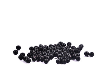 Black Onyx Garden Flower Seeds are hard seeds laid on a white background.