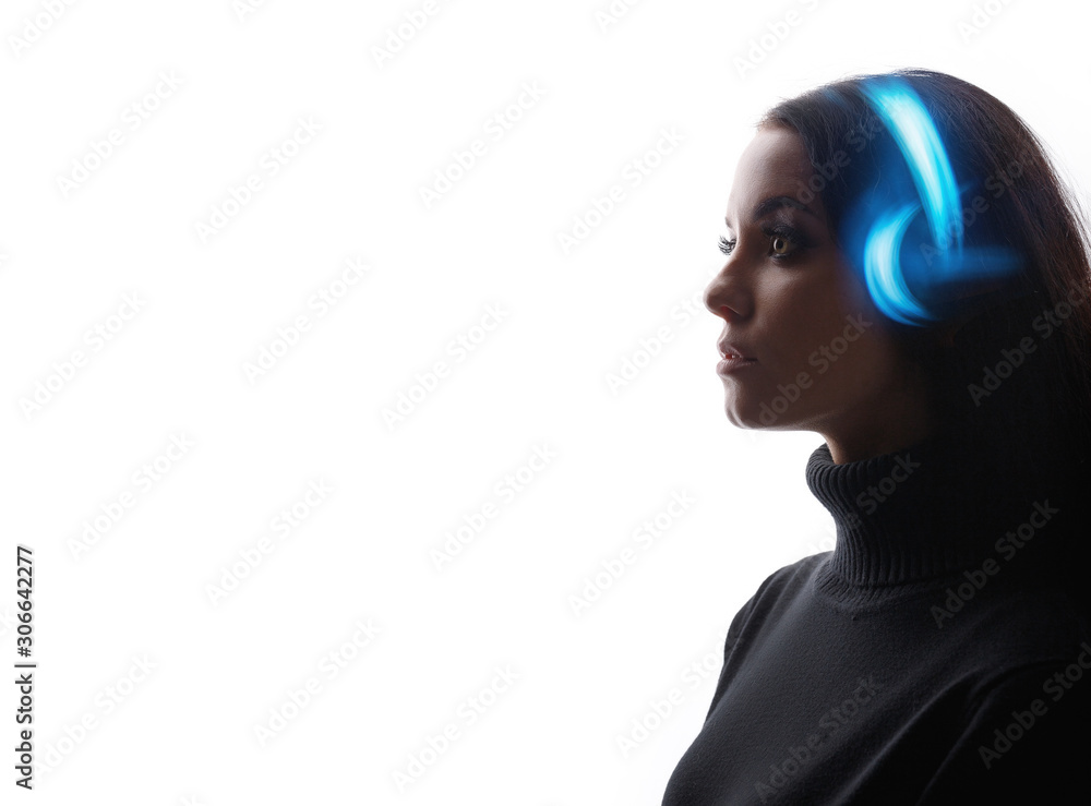 Wall mural beautiful woman in headphones listening music. white background. blue neon light. free space for tex