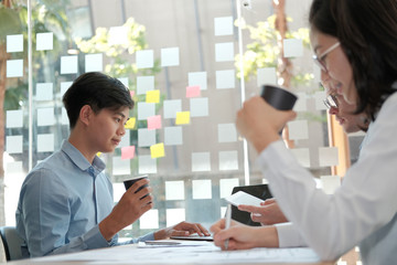 business people discussing on performance revenue in meeting. businessman working with businesswoman.