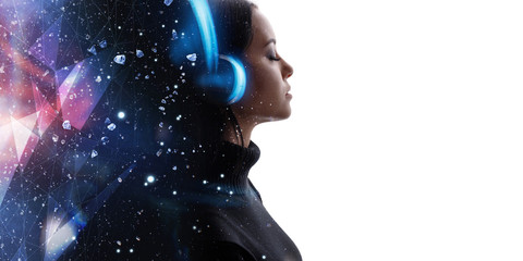 Portrait of woman in headphones listening music with closed eyes. Double exposure of female face...