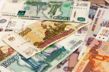 Fototapeta na wymiar Money background. Big pile of rubles. Background of paper banknotes.