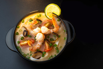 thai soup with shrimps, onions and tomatoes