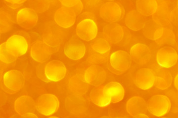 Golden yellow bokeh background. Concept for Christmas, New Year, Wealth, Prosperity, Happiness, Joyful and All Celebrations.