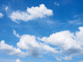 Obraz na płótnie Canvas White clouds on a blue sky background