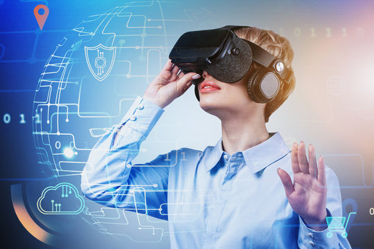 Woman in VR glasses using digital GUI