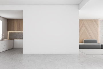 White kitchen and living room with mock up wall