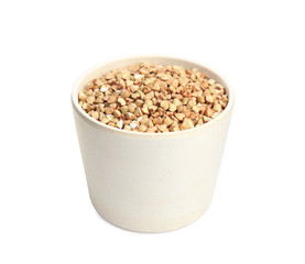 Green buckwheat in bowl isolated on white