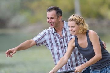 portrait of a couple fishing