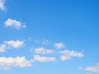 White clouds on a blue sky background