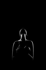 female silhouette on black