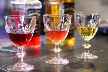 Tincture on a bar counter. Bulk and tincture of glasses on a bar counter.