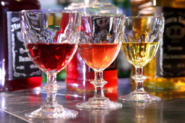 Tincture on a bar counter. Bulk and tincture of glasses on a bar counter.