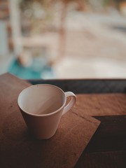 cup of coffee on wooden table