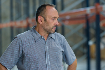 portrait of a worker in a warehouse